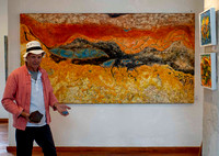 Heinz Kunzli with one of his paintings.
